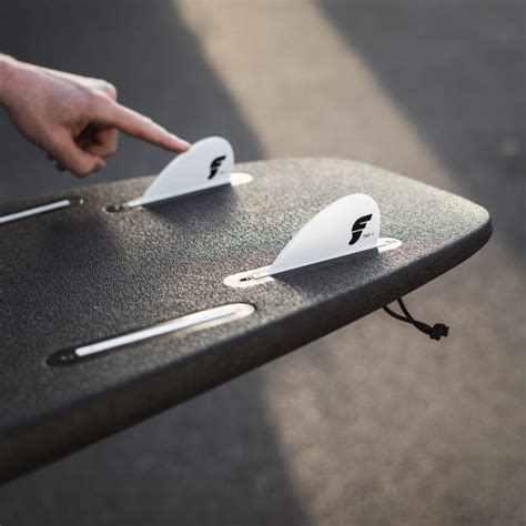 Surfboard fins for riding different kinds of waves and surfs play an ...