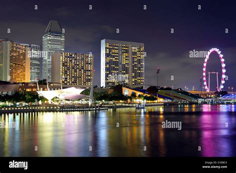 Singapore city skyline at night Stock Photo - Alamy