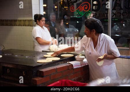 Women make hand made tortillas at the Old Town Mexican Cafe, Old Town, San Diego, CA, (Photo by ...