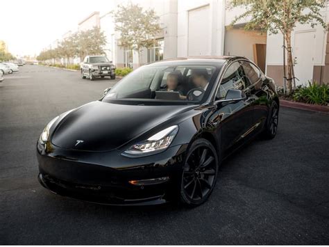 Black on Black Model 3 : teslamotors