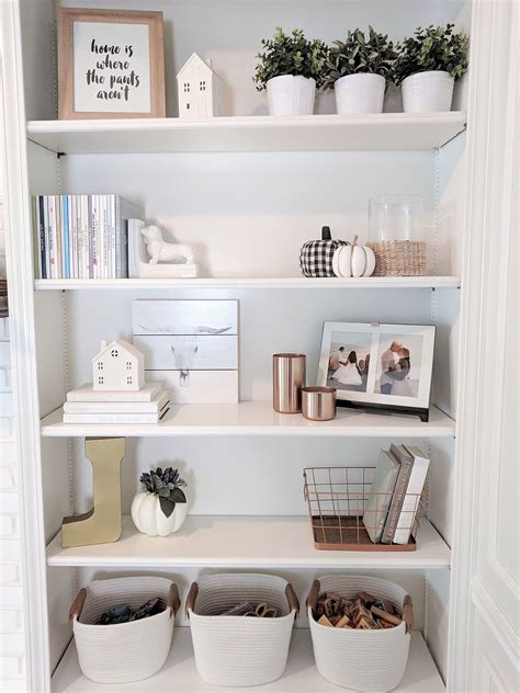 How to Decorate Shelving - arinsolangeathome | Shelf decor living room ...