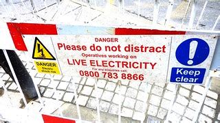 Don't distract the electricians sign, Hackney, London, UK | Flickr