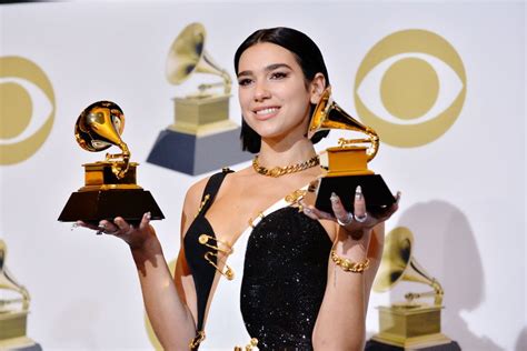 LOS ANGELES, CALIFORNIA - FEBRUARY 10: Dua Lipa attends the 61st Annual ...