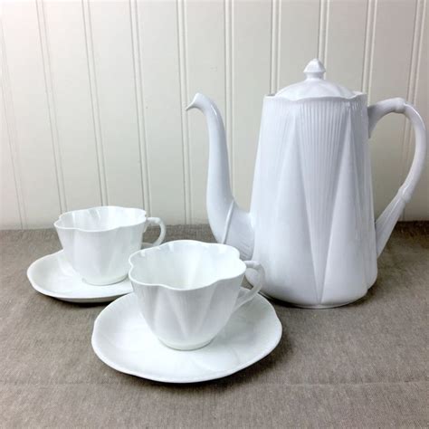 Shelley Dainty White coffee pot and two cups and saucers - all white Shelley china | NextStage ...
