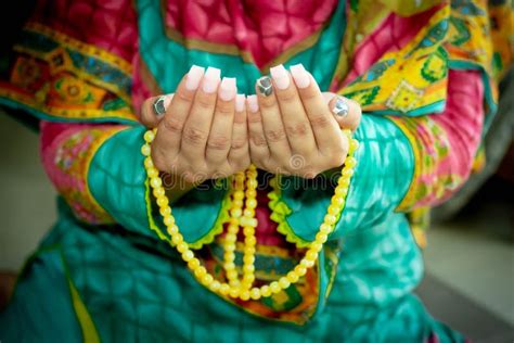 Hands of the Muslim Women Praying with Beat and Black Round,Muslim Woman Praying with Hands and ...