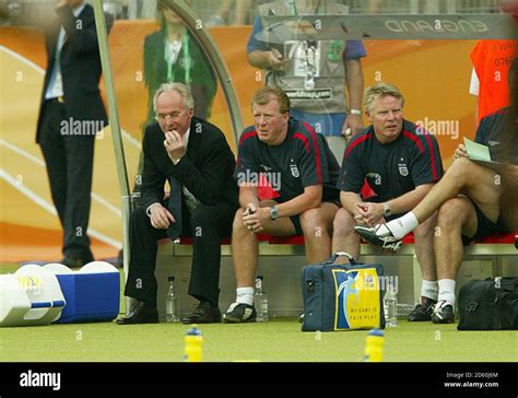 England coach Sven Goran Eriksson looks on from the bench Stock Photo ...