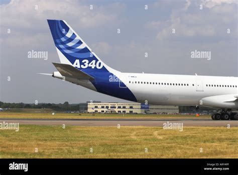 Airbus A340 600 taxiing after landing at Farnborough Stock Photo - Alamy