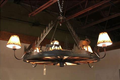 DIY Wagon Wheel Chandelier Photos | Design Idea and Decor | Wheel chandelier, Wagon wheel ...