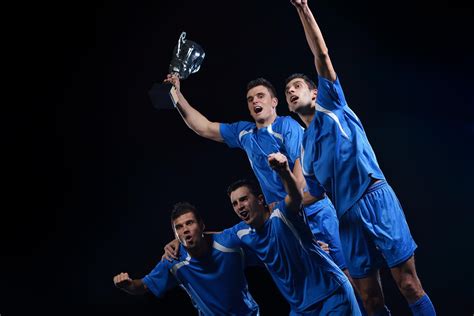 soccer players celebrating victory 11619944 Stock Photo at Vecteezy