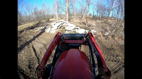 #8 Rural king rk55 tractor loader work moving concrete and dirt to creek - YouTube