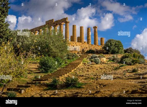 Ruined Temple of Heracles columns in famous ancient Valley of Temples, Agrigento, Sicily, Italy ...