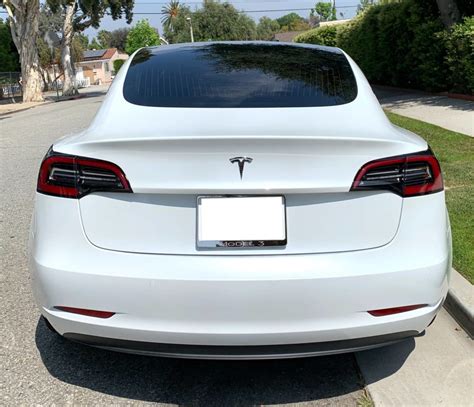 White Tesla model 3 with 30% tint on rear window – Tesla Model 3 Wiki