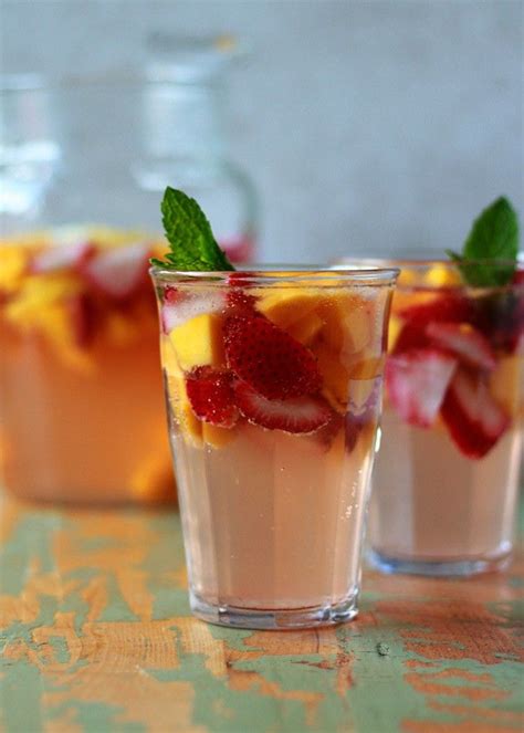 White Strawberry-Mango Sangria | Recipe | Mango sangria, Lemon sangria, Yummy drinks