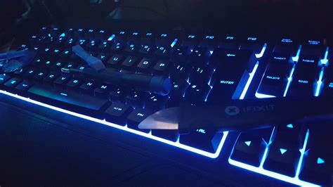 Corsair K55 RGB gaming keyboard littered with tools from iFixit ...