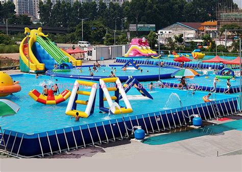 Unitized Amusement Inflatable Water Parks , Blow Up Water Slide With Bracket Pool