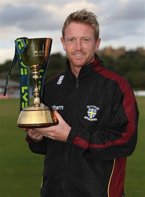 Paul Collingwood poses with the Championship trophy | ESPNcricinfo.com