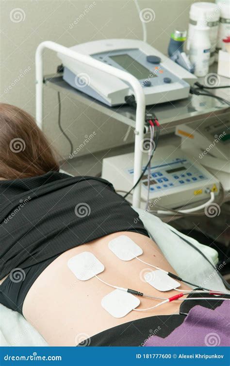 Electrotherapy for a Girl in the Physiotherapy Room Stock Photo - Image ...