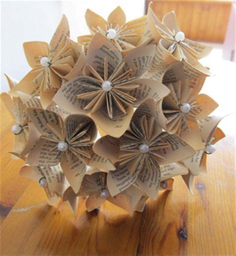 How to make a kusudama bouquet from folded book pages taped to fake flower stems. | Paper ...