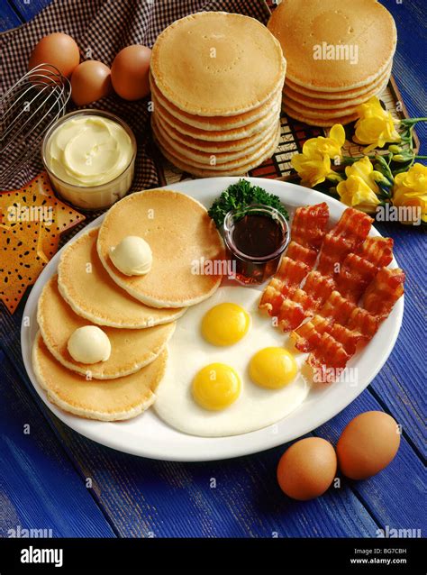 Pancakes, eggs and bacon breakfast Stock Photo - Alamy