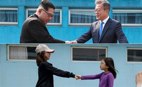 Tourists Re-Enact Famous North And South Korea Handshake At Replica ...