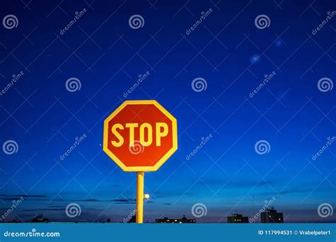 Stop sign, night scene stock image. Image of road, pole - 117994531