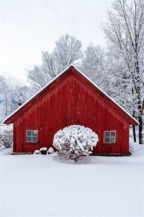 Red Barn in Snow: The Best Winter Scene - Town & Country Living