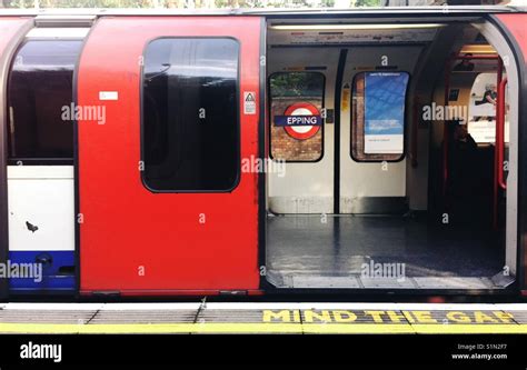 London Central Line tube train at Epping Station showing station name ...