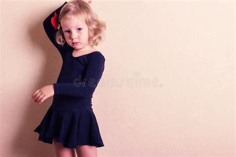 Funny little girl dancing. stock image. Image of female - 58059549