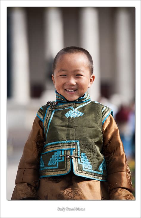 Traditional Vest - A young Mongolian boy dressed in ceremonial garb ...