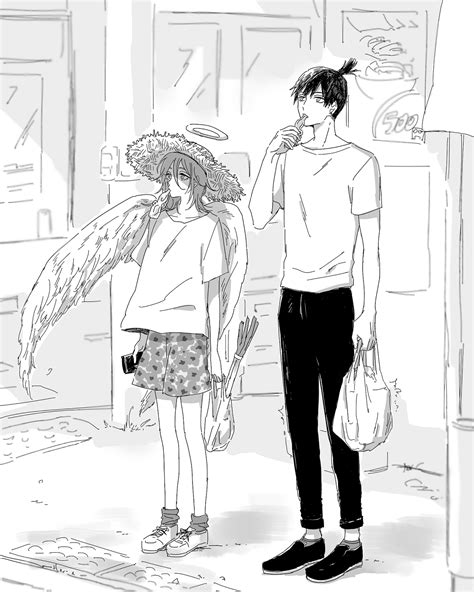 a man and woman standing next to each other in front of a building with an angel wings on their head