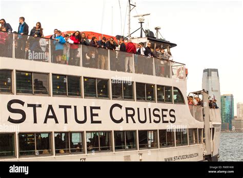 Statue Cruises passenger ferry taking tourists to the Statue of Liberty from Battery Park ,New ...