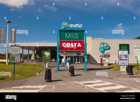 A Moto services stop with M&S and costa coffee on a motorway in England ...