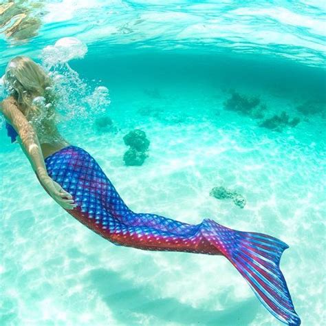 Show your true mermaid colors in dazzling shades of blue and red in Fin Fun's July Tail of the ...