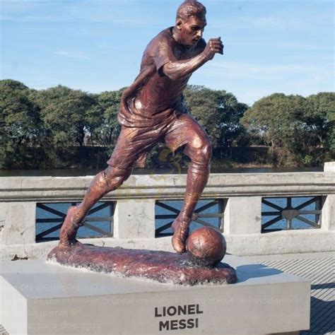 Lionel Messi soccer player statue