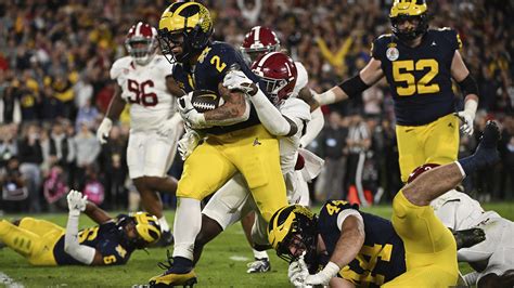 Michigan outlasts Alabama 27-20 in OT, advances to championship game - ABC11 Raleigh-Durham