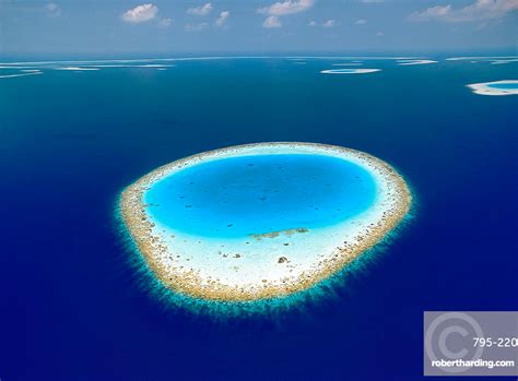 Aerial view of atolls and coral reefs in the Maldives, Indian Ocean Aerial Photo, Biomes, Colour ...