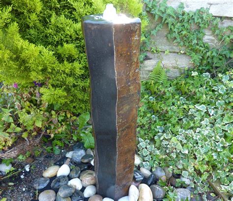 Drilled 70cm Polished Basalt Feature | Outdoor water features, Water ...