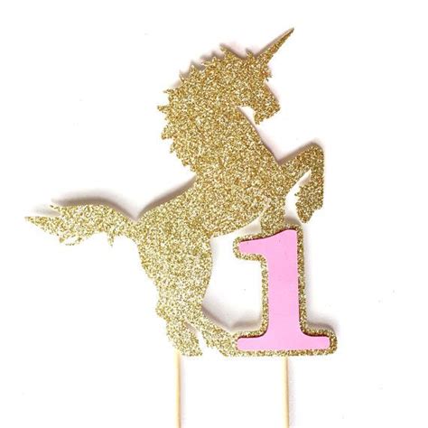 This gold glitter unicorn birthday cake toppers makes a whimsical addition to any unicorn party ...