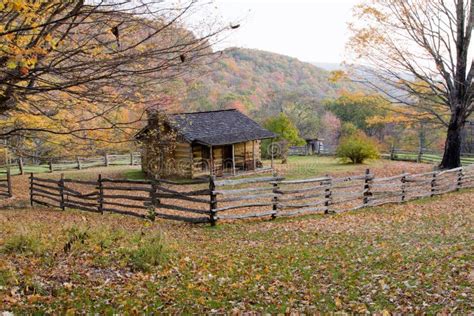 Autumn Log Cabin With Rail Fence Stock Photo - Image: 10119888