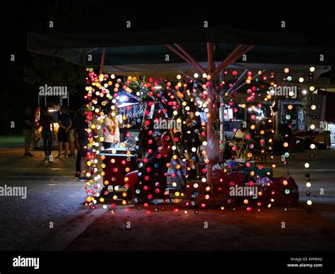 Street market stall with coloured lights at night in Athens Stock Photo ...