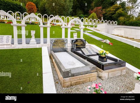 Memorial arches and graves, Bryntaf Cemetery, Aberfan Cemetery, Glamorgan, Wales, resting place ...