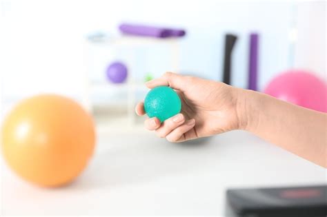 Premium Photo | Hand of woman with stress ball in clinic