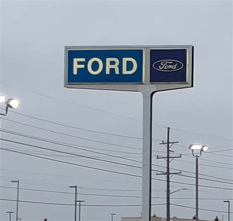 What signs at Ford dealerships looked like back in the 90s and maybe earlier, although a few in ...