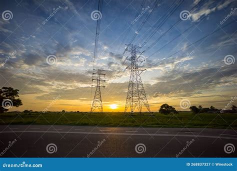 Tall Electric Post with a Golden Sunset Background Stock Image - Image of golden, tall: 268837327