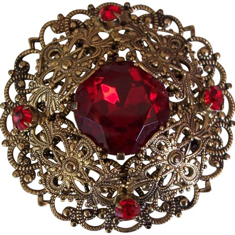 Vintage Brass Filigree Red Stone Brooch Czech or German from modseller on Ruby Lane