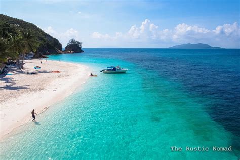 Pulau Rawa or Rawa island is a small tropical paradise, with turquoise blue waters and white ...