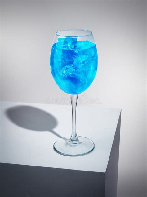 Exquisite Blue Cocktail with Ice-cubes Stock Photo - Image of curacao, liquid: 155540250