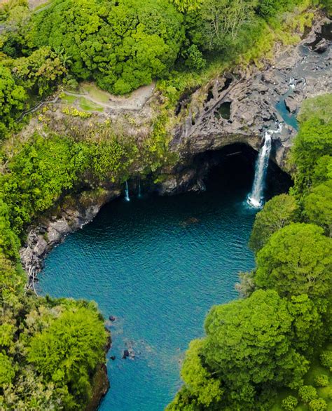 Rainbow falls in Hawaii from above [3233x4000] [OC] : r/EarthPorn