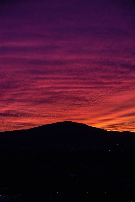 Silhouette of Mountain During Sunset · Free Stock Photo