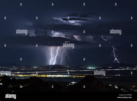 Lightning in a monsoon thunderstorm over Phoenix, Arizona Stock Photo ...